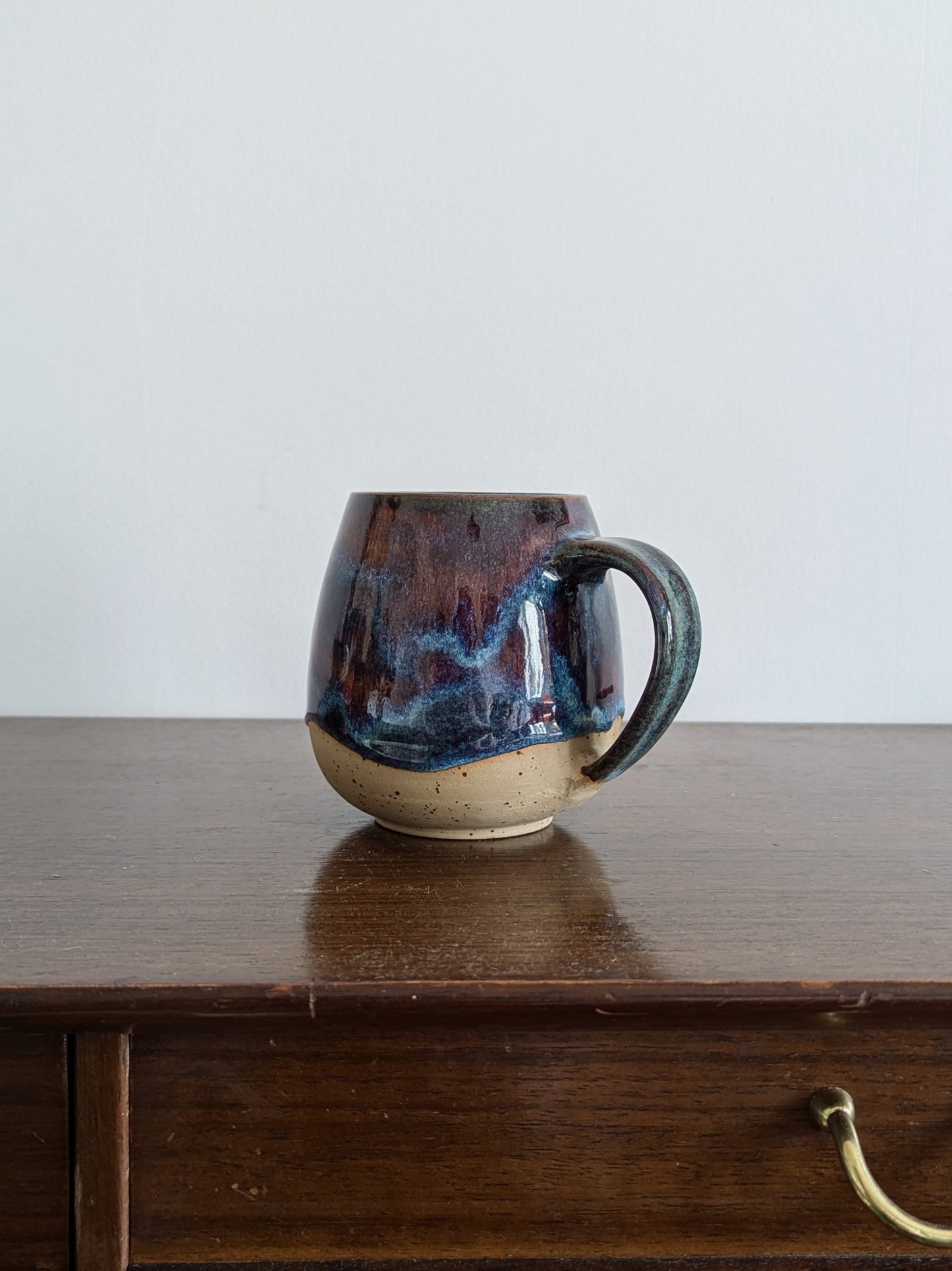 Pumpkin Ghostie mug in Aurora glaze