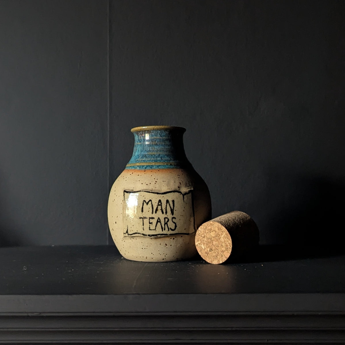 Man Tears Potion Bottle