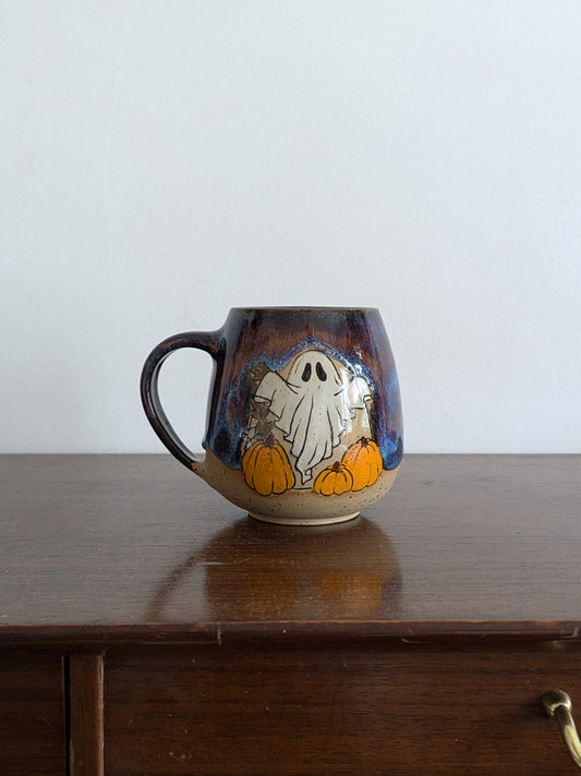 Pumpkin Ghostie mug in Aurora glaze