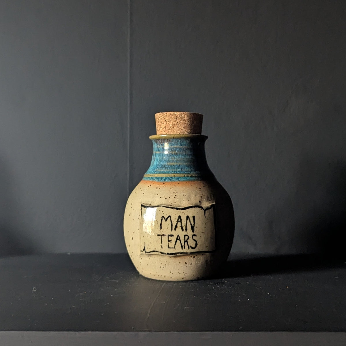 Man Tears Potion Bottle