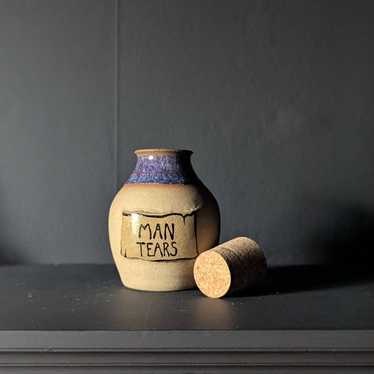 Man Tears Potion Bottle